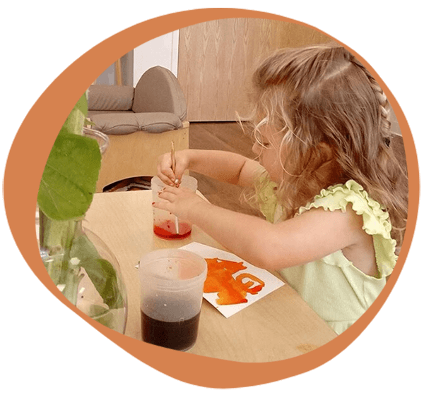 a child doing a watercolor painting