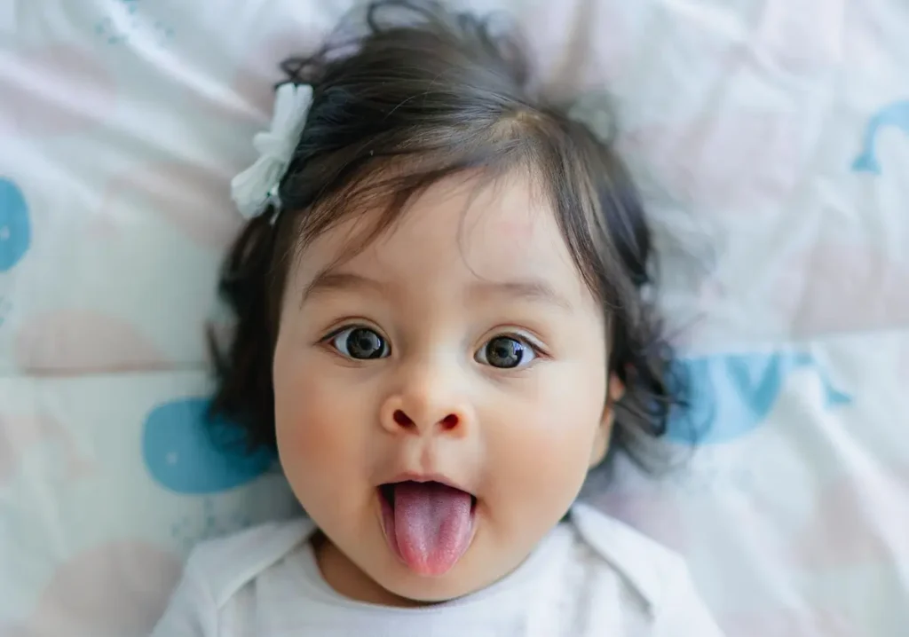 A child with her tongue out