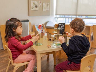 two students at one of our daycare facilities